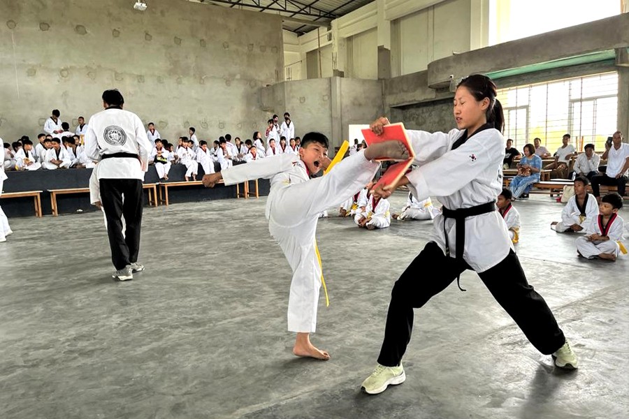 A student demonstrates his skill during the Colour Belt Taekwondo promotion test conducted by Faith in Action Taekwondo Academy on May 13.